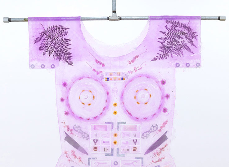 Shirt made from purple silicon with objects pressed into it