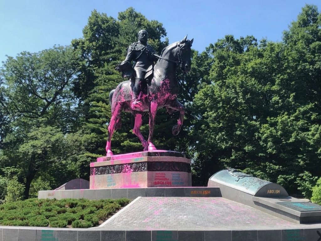 King Edward statue with covered with pink paint. 